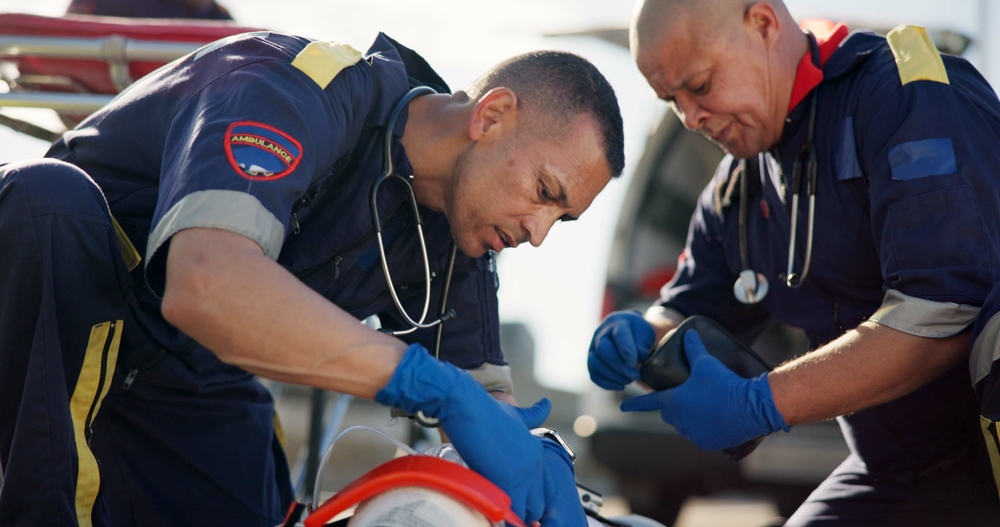 EMTs working on Chicago car accident victim