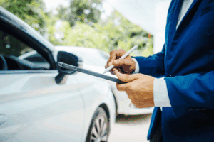 insurance adjuster with auto accident claim