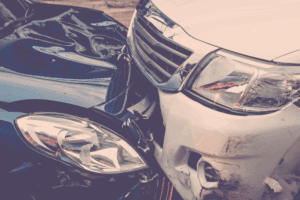 close up of cars crashed into one another